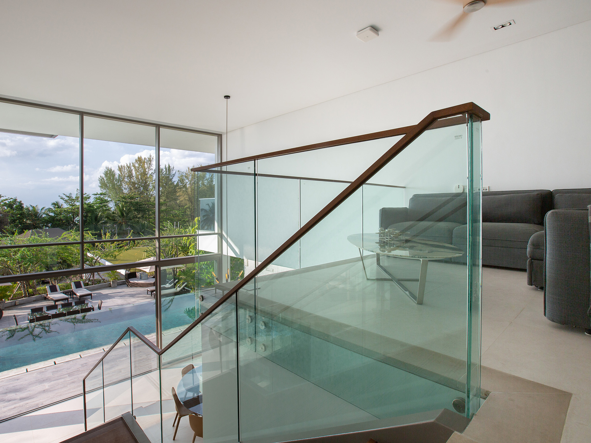 Malaiwana Patio Duplex - A relaxing view of the pool from the loft