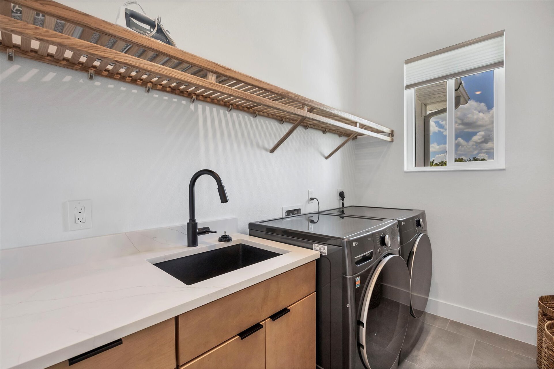 Laundry room with full-size washer and dryer