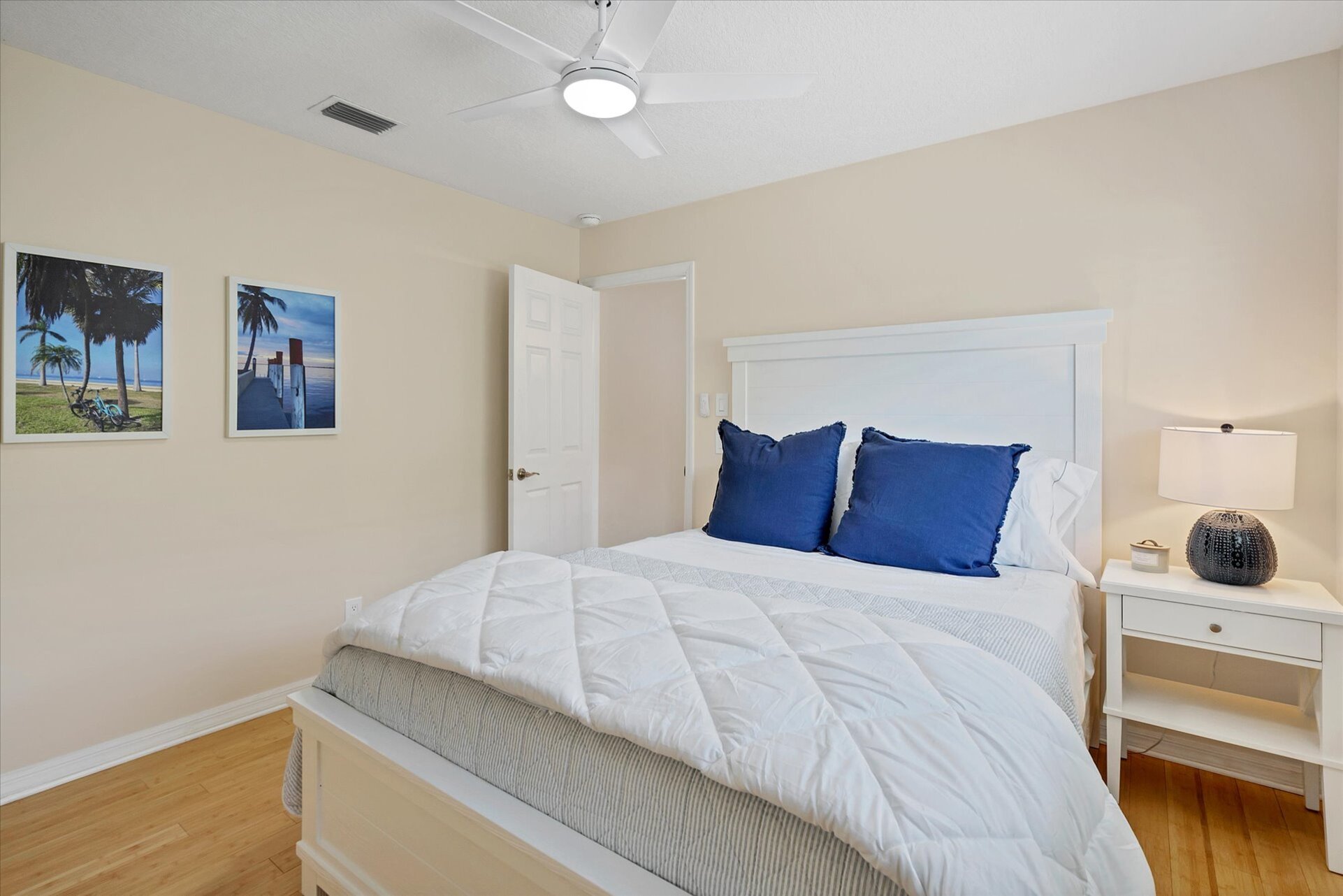 Guest bedroom with queen bed and 50-inch Smart TV