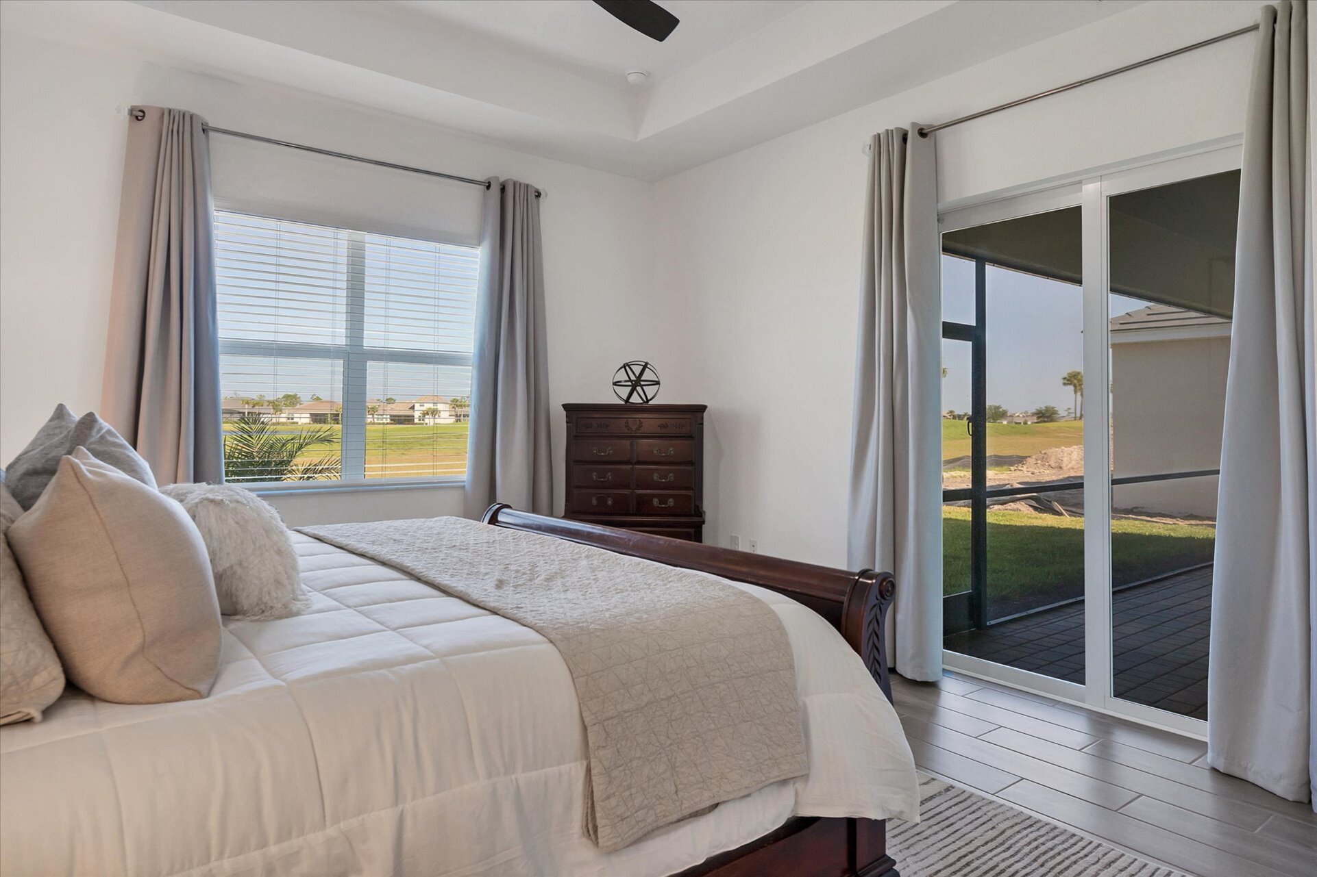 Primary bedroom with king bed, lanai access and ensuite