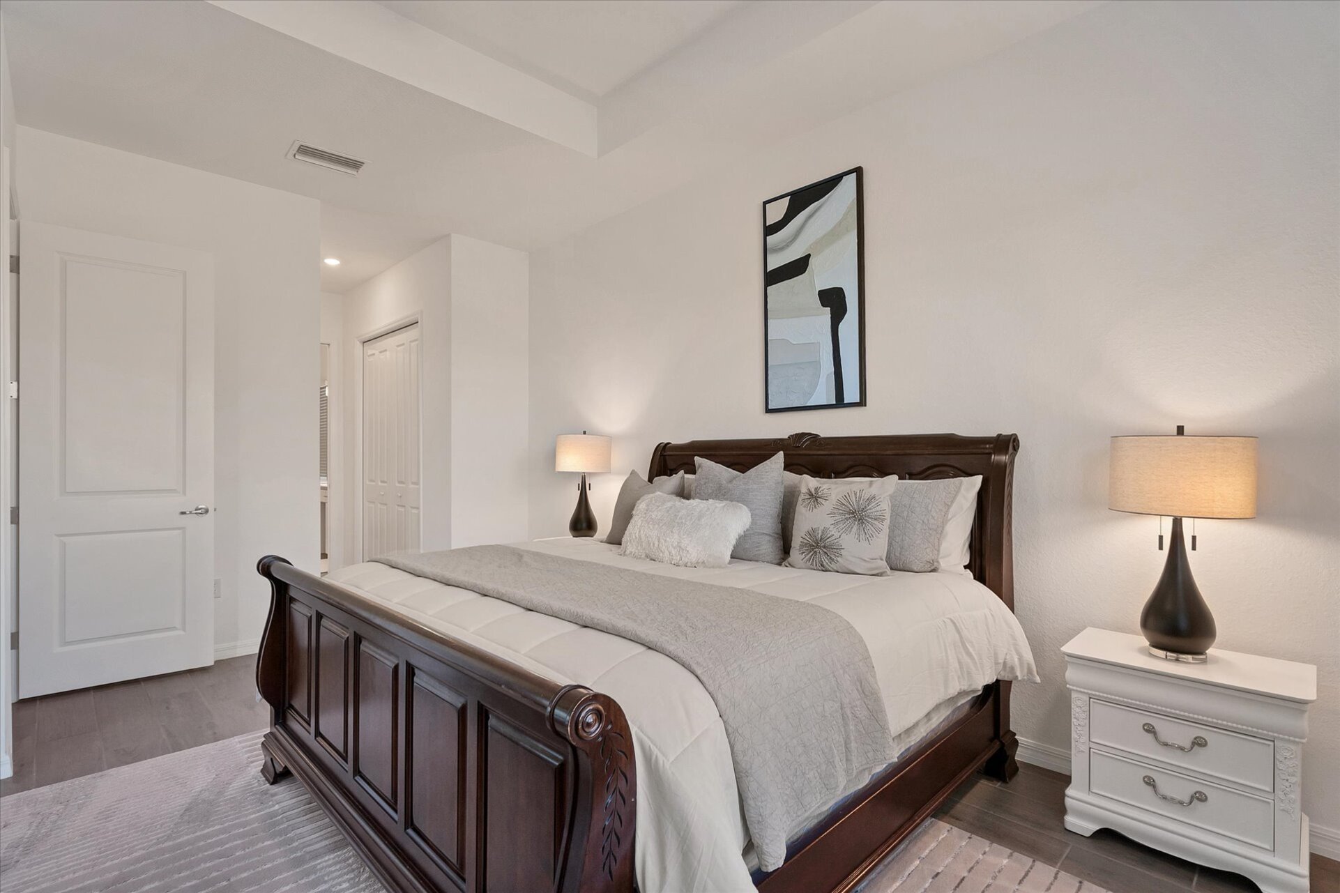 Primary bedroom with king bed, lanai access and ensuite
