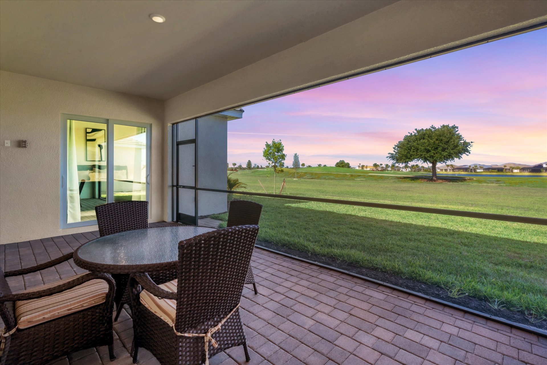 Lanai overlooking golf course and pond. Lanai faces west