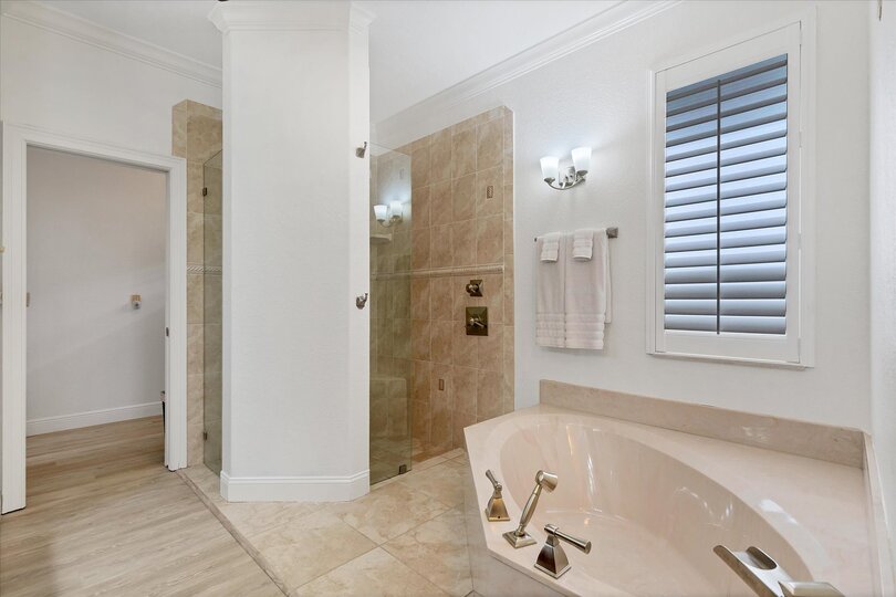 Ensuite has walk-in shower and a soaking tub