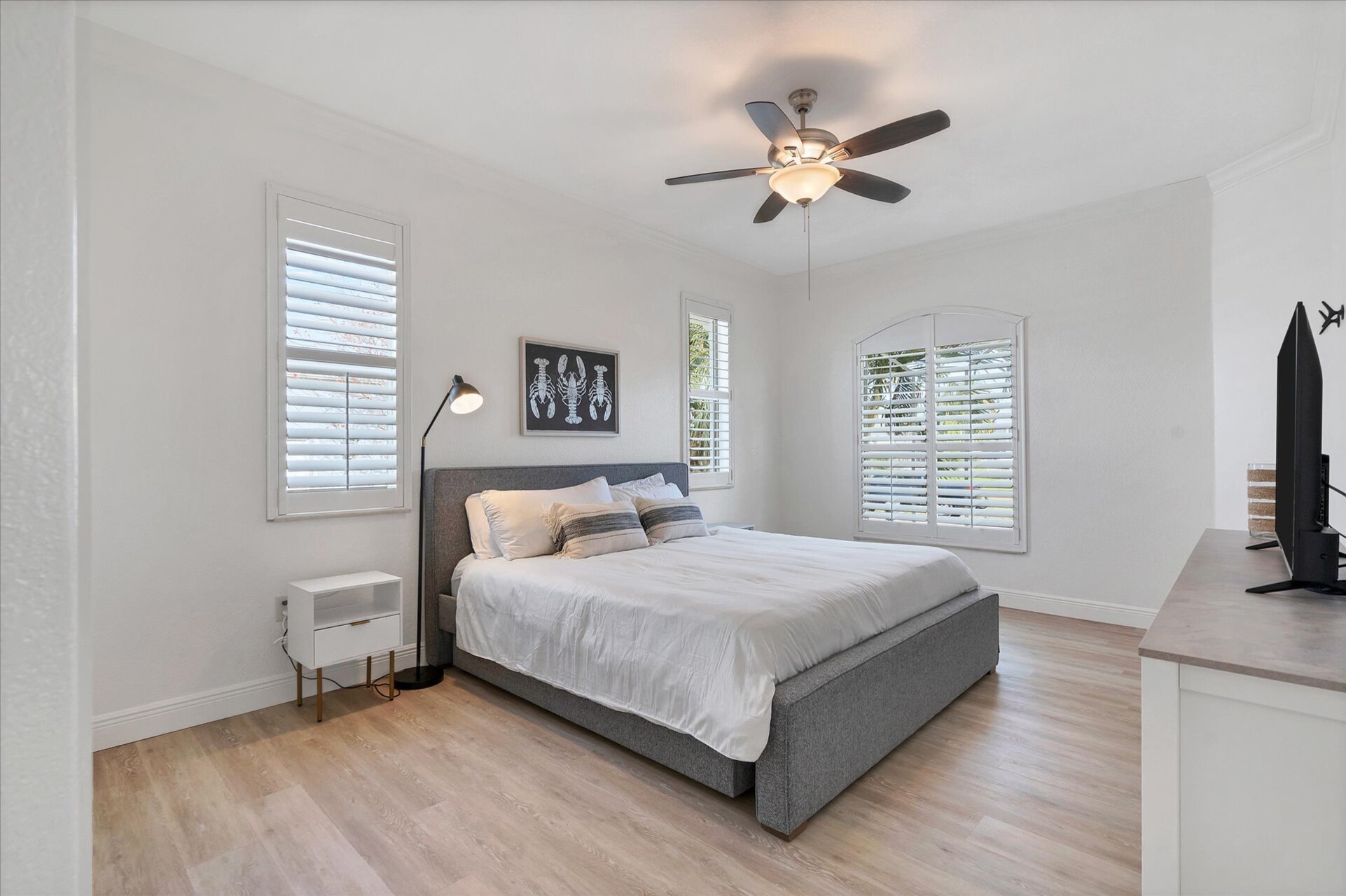 Guest bedroom has a king bed and two pullout twin trundle beds