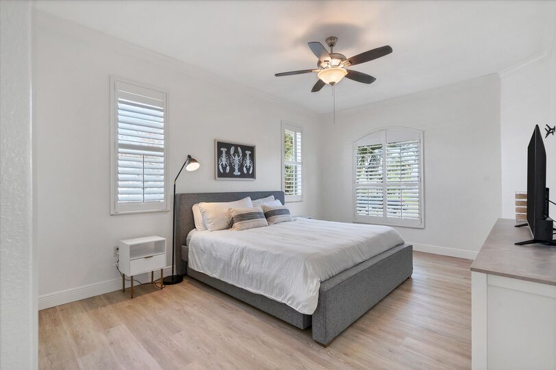 Guest bedroom has a king bed and two pullout twin trundle beds