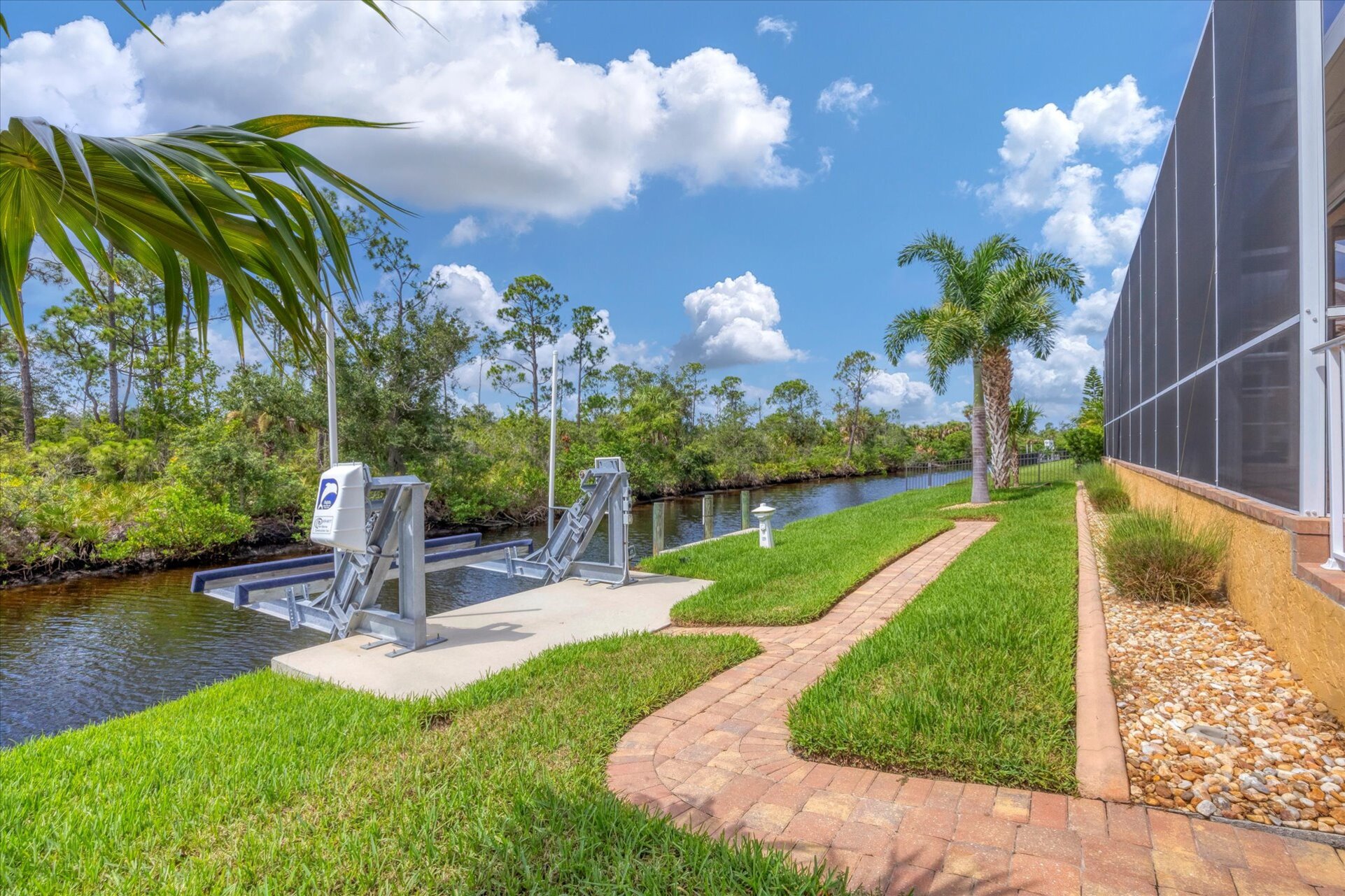 Path leading to boat dock. (Boat lift is not for guest use). Dock size is 14' x 6'. Dock also fish lights