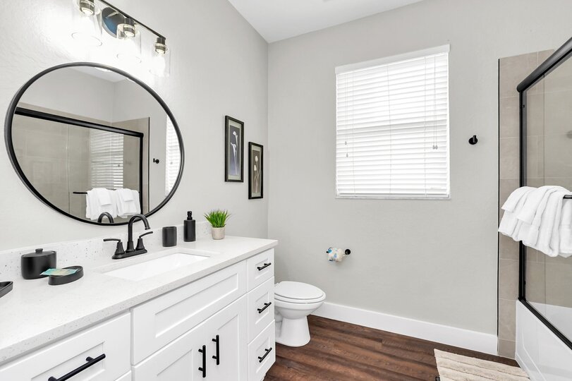 Bathroom with combination shower and bathtub