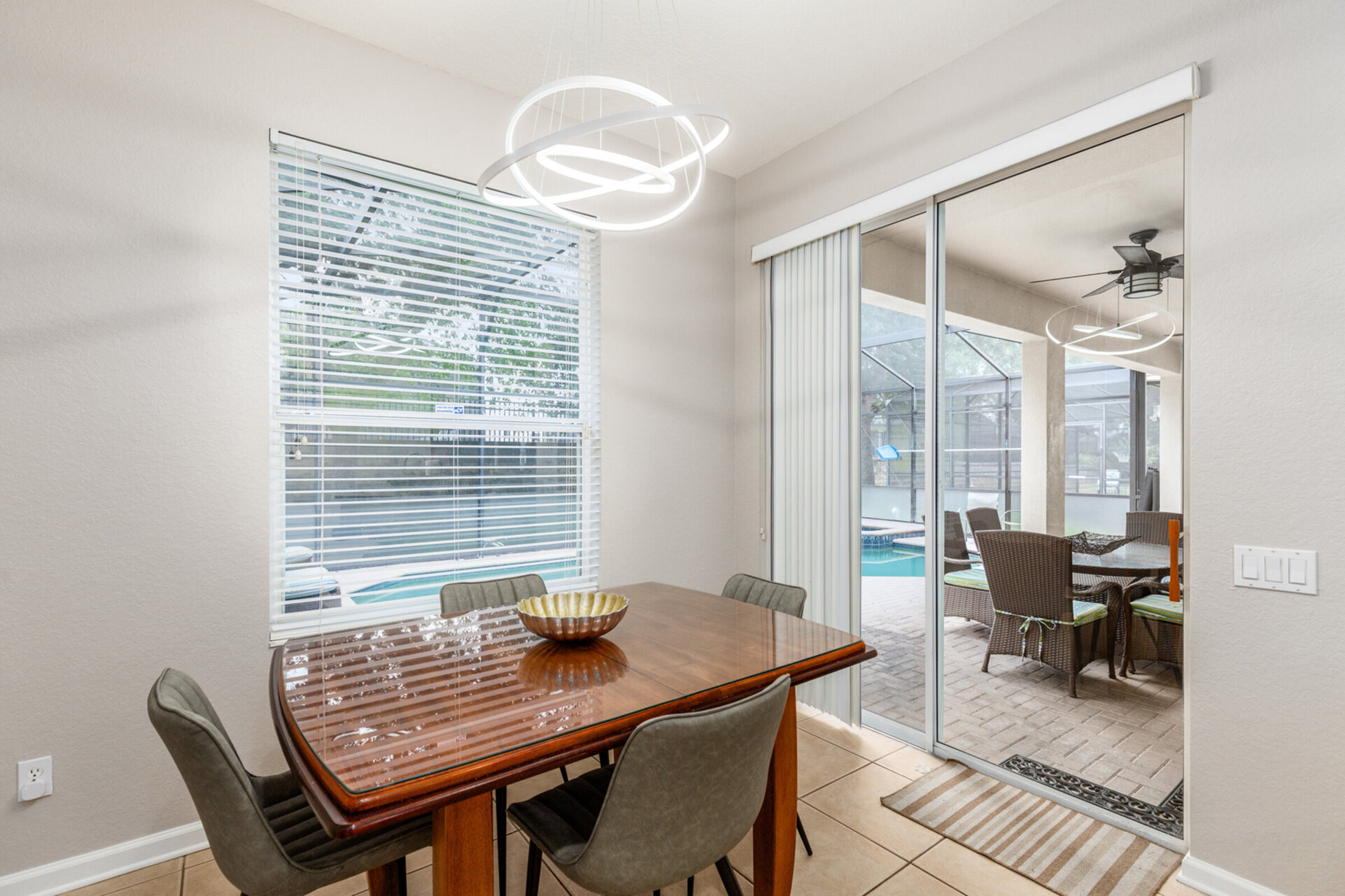 Eat a meal in the breakfast nook and then head out to the pool and patio