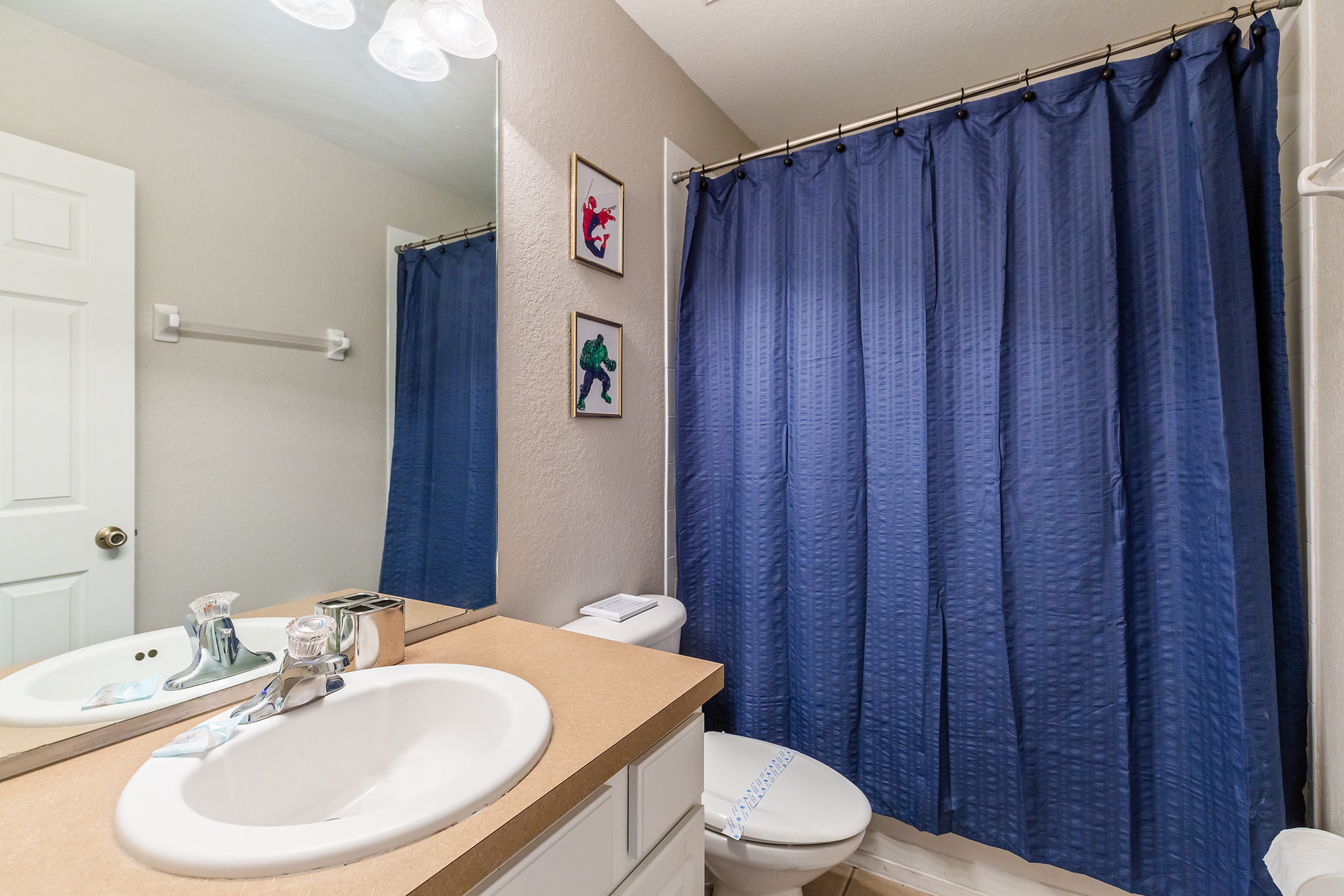 En-suite bathroom connected to the superhero themed bedroom