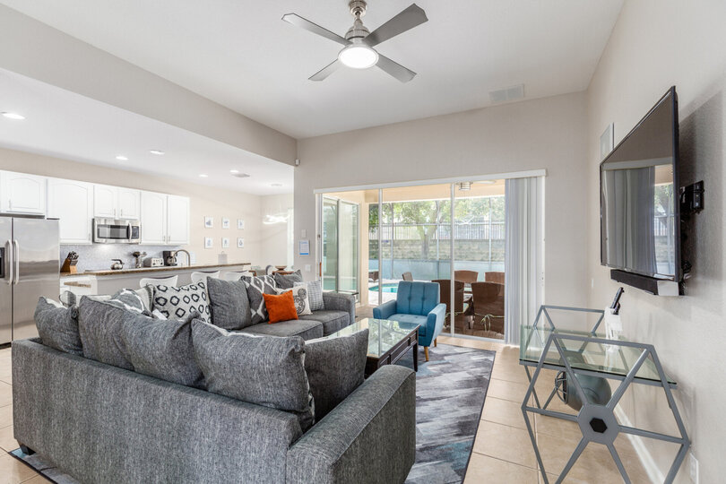 Relax and unwind in the living area with views of the pool area