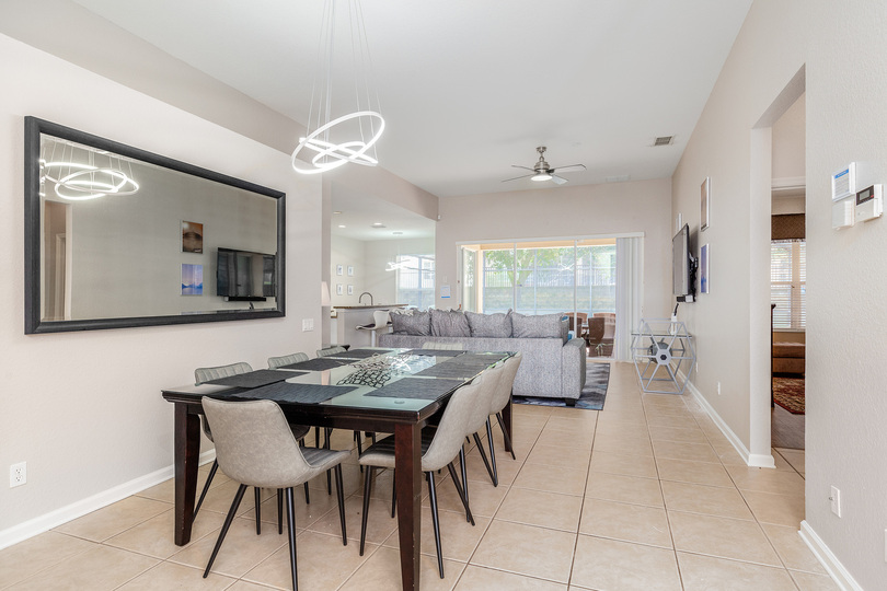 Dine at the formal dining table with seating for 8