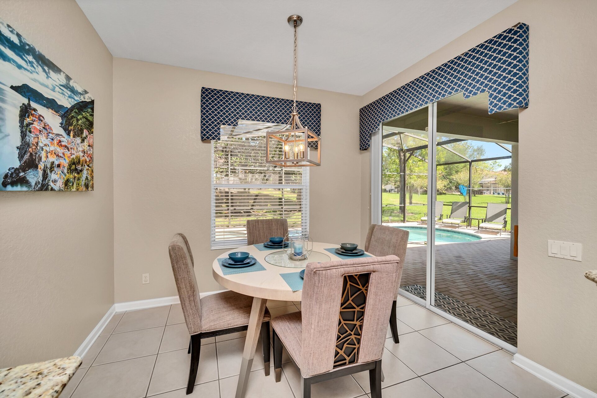 The kitchen nook features a table with seating for 4 for quick meals