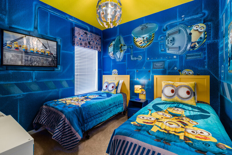 Kids will go bananas for this fun custom bedroom with two twin beds
