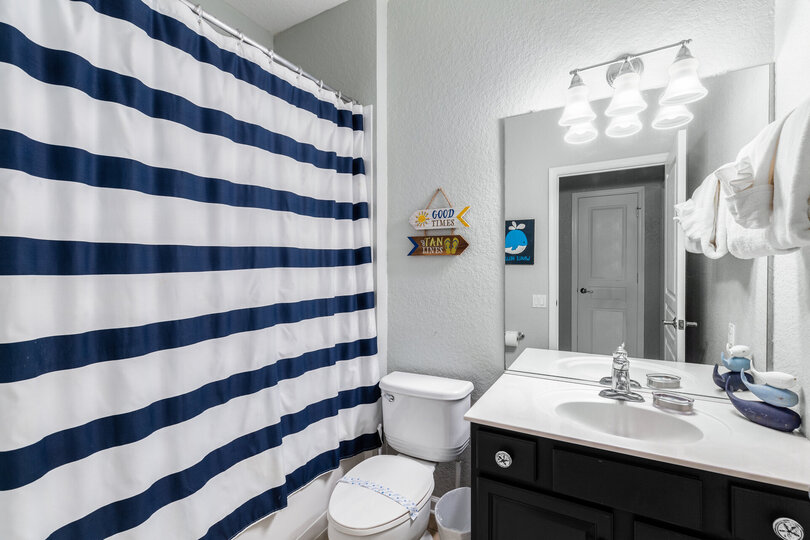 Upstairs bathroom with shower, toilet and tub