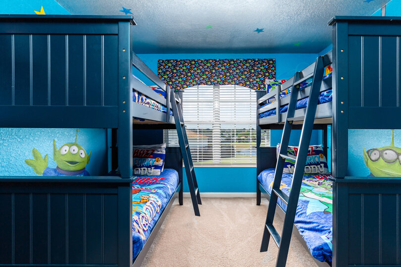 With two twin/twin bunk beds, kids will love the out-of-this-world bedroom