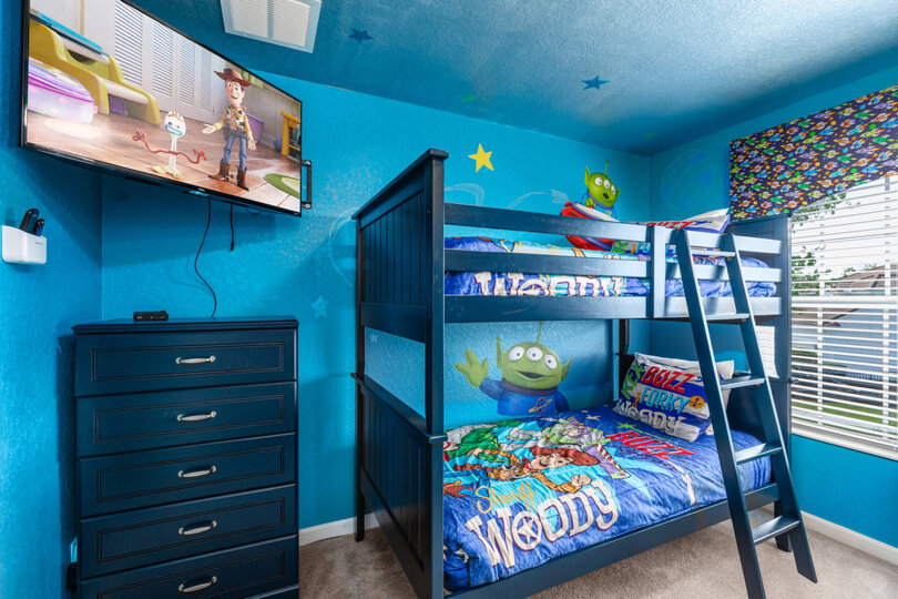 With a huge flatscreen TV, this is the perfect room to relax after long days at the theme park.