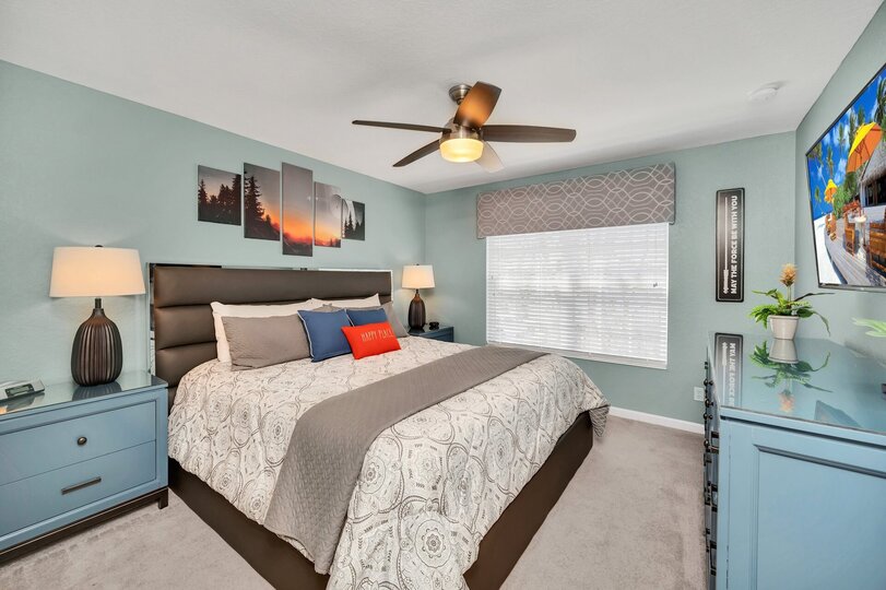 King bedroom located on the second floor with ceiling fan (Updated Feb. 2022)