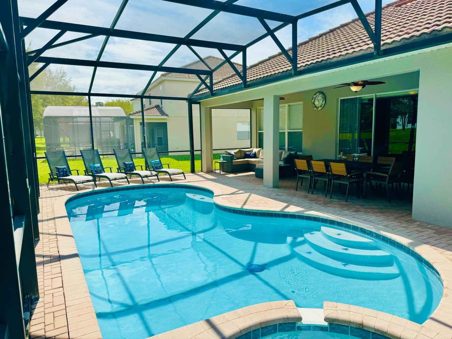 Enjoy the Florida sunshine at your own private screened-in pool