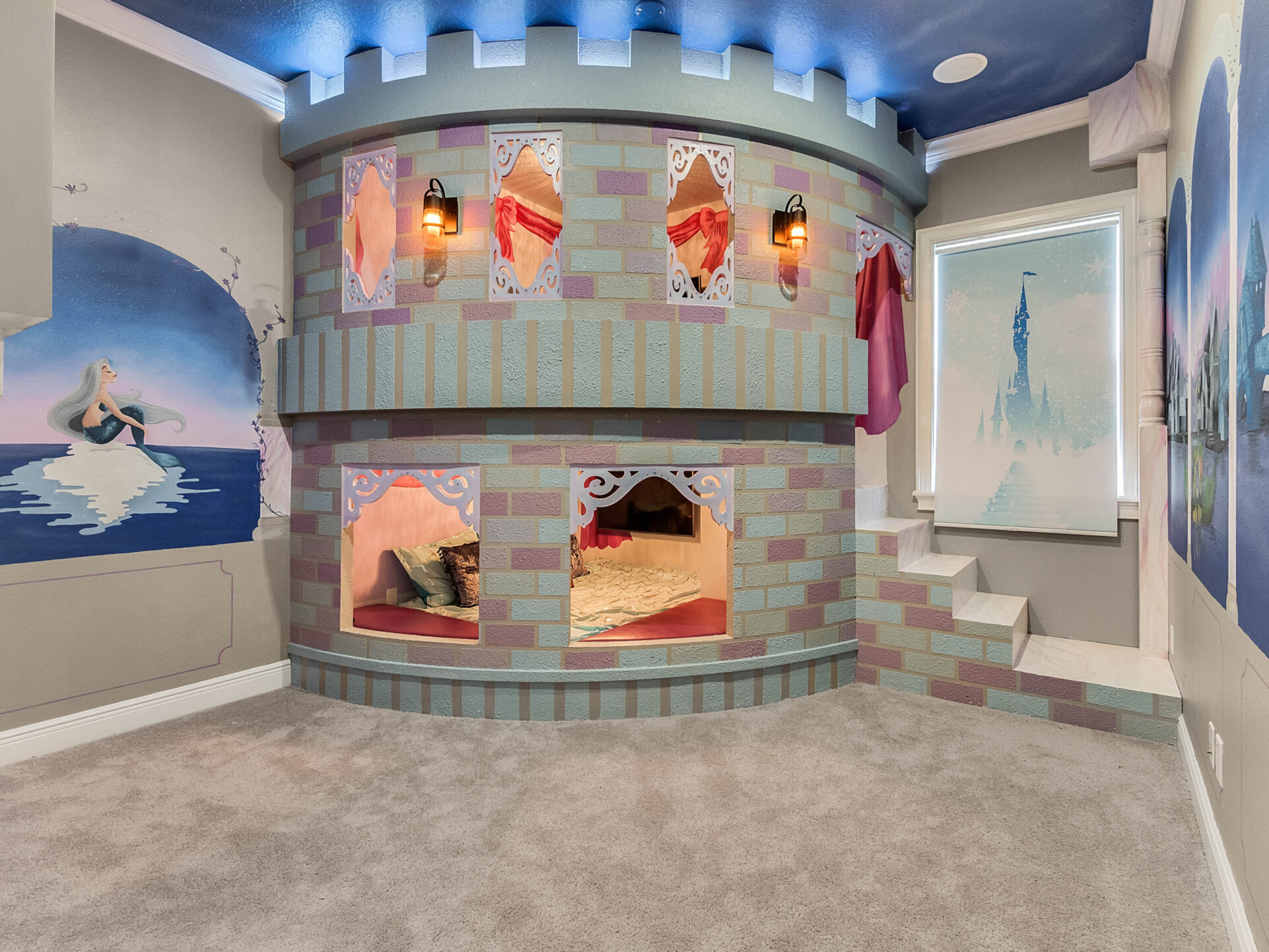 A magical castle awaits princesses in this amazing custom built full over full bed