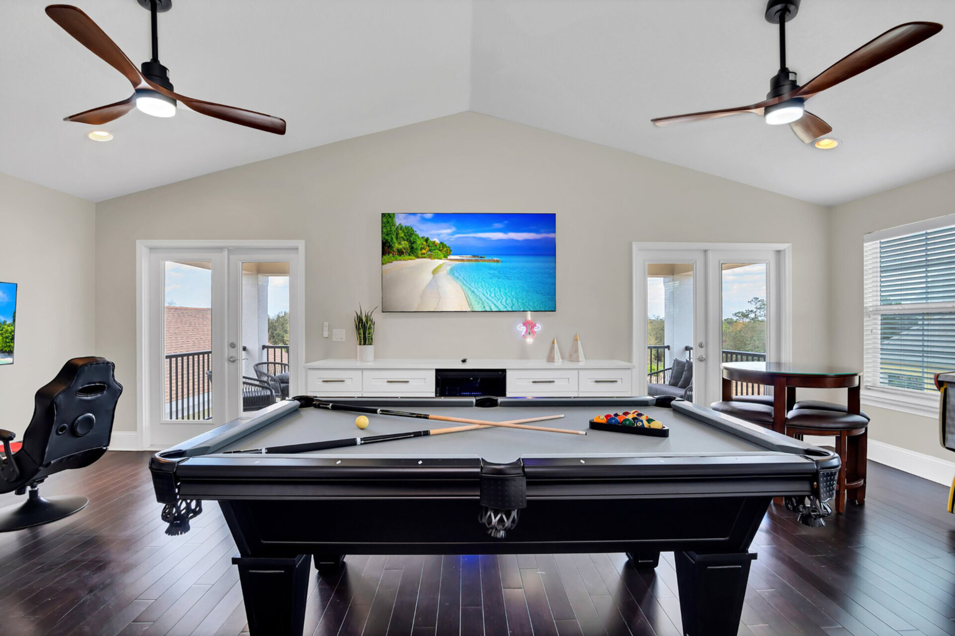 Play a game of pool with access to the 3rd floor balcony