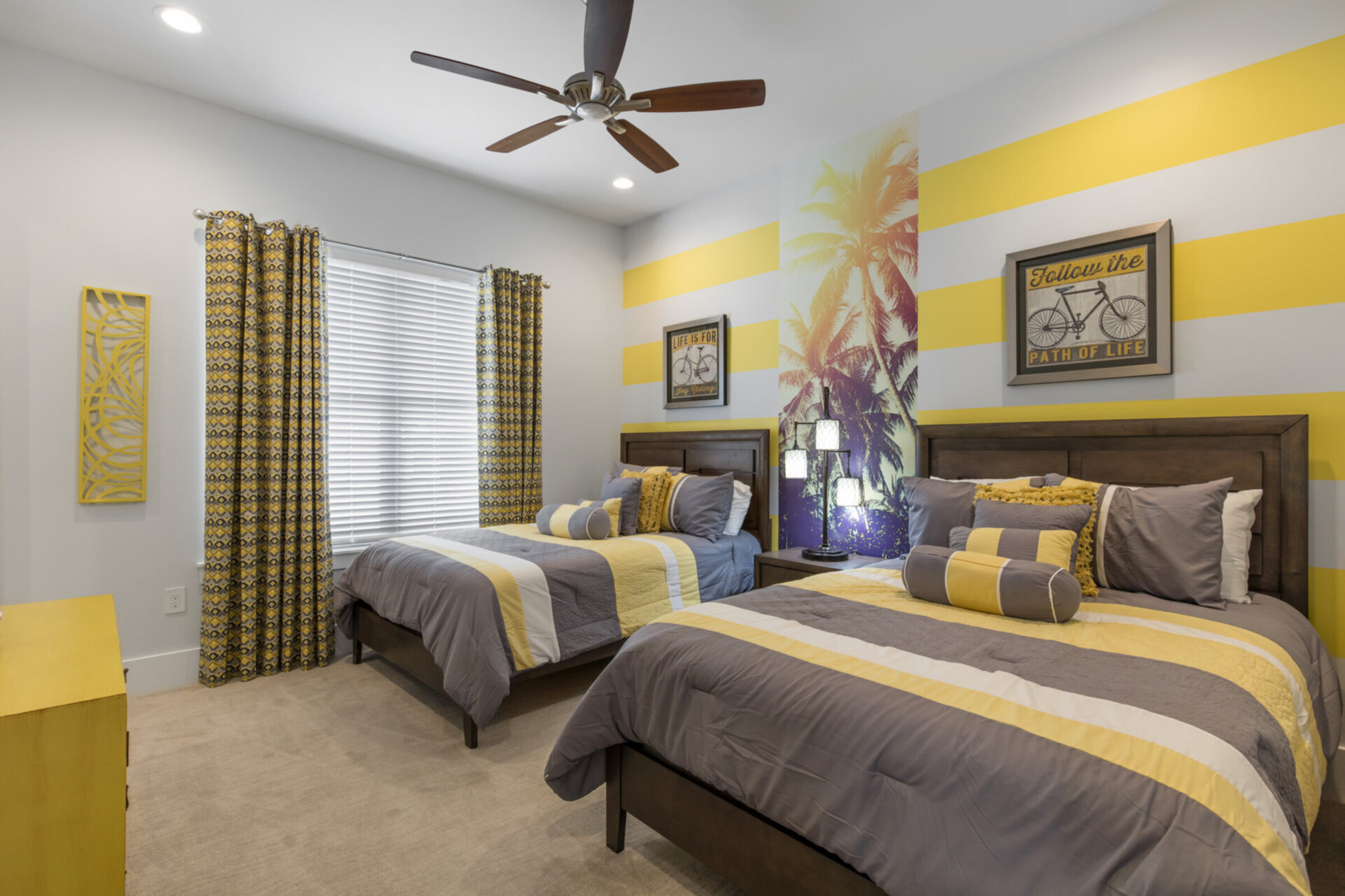 Contemporary style bedroom with two full beds