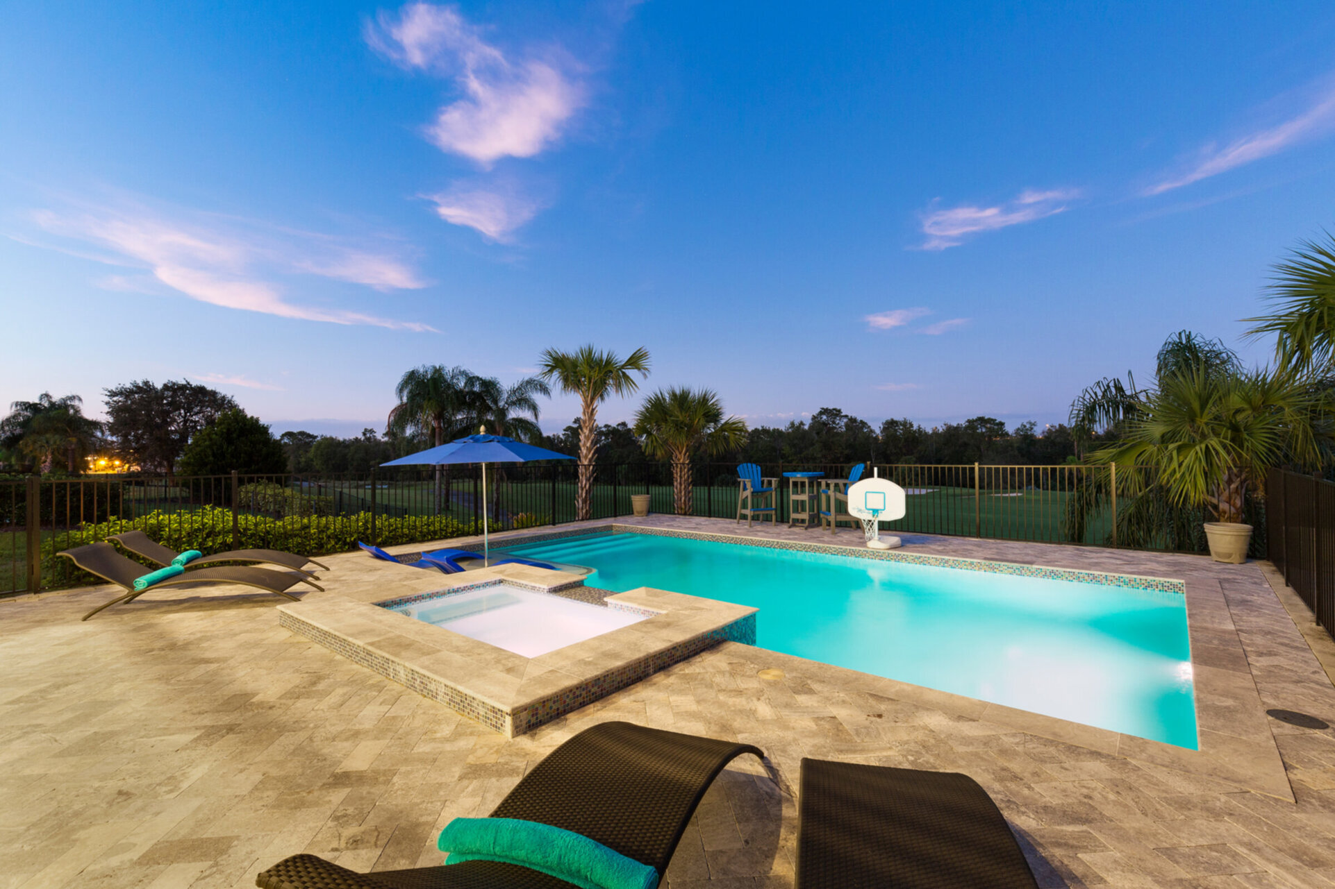 The pool overlooks the golf course