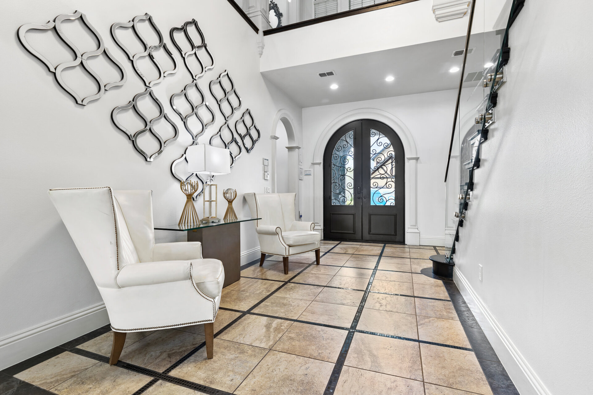 Walk through the elegant foyer to the living area