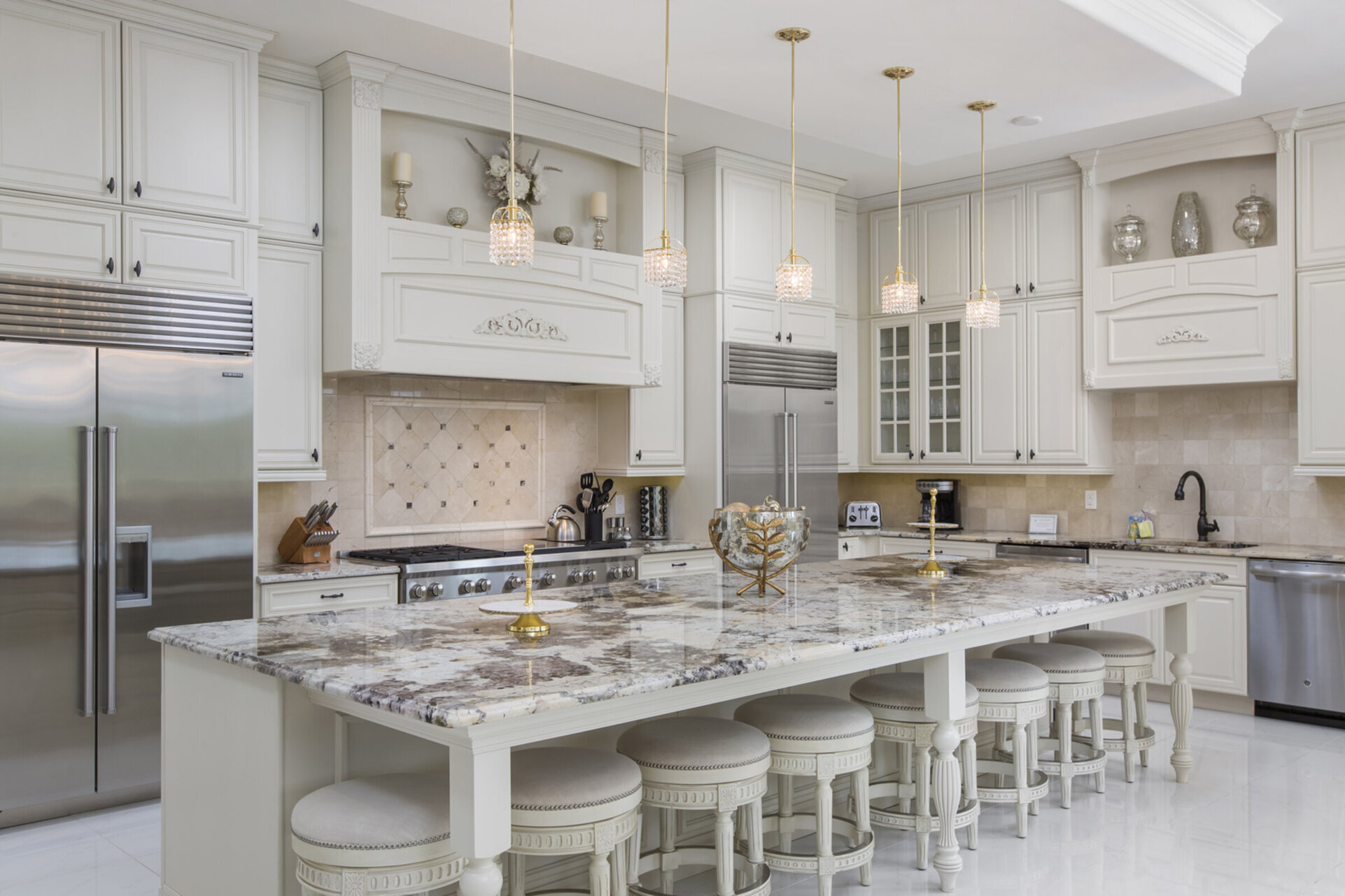 The upgraded kitchen has double appliances, ample granite counter space and breakfast bar seating