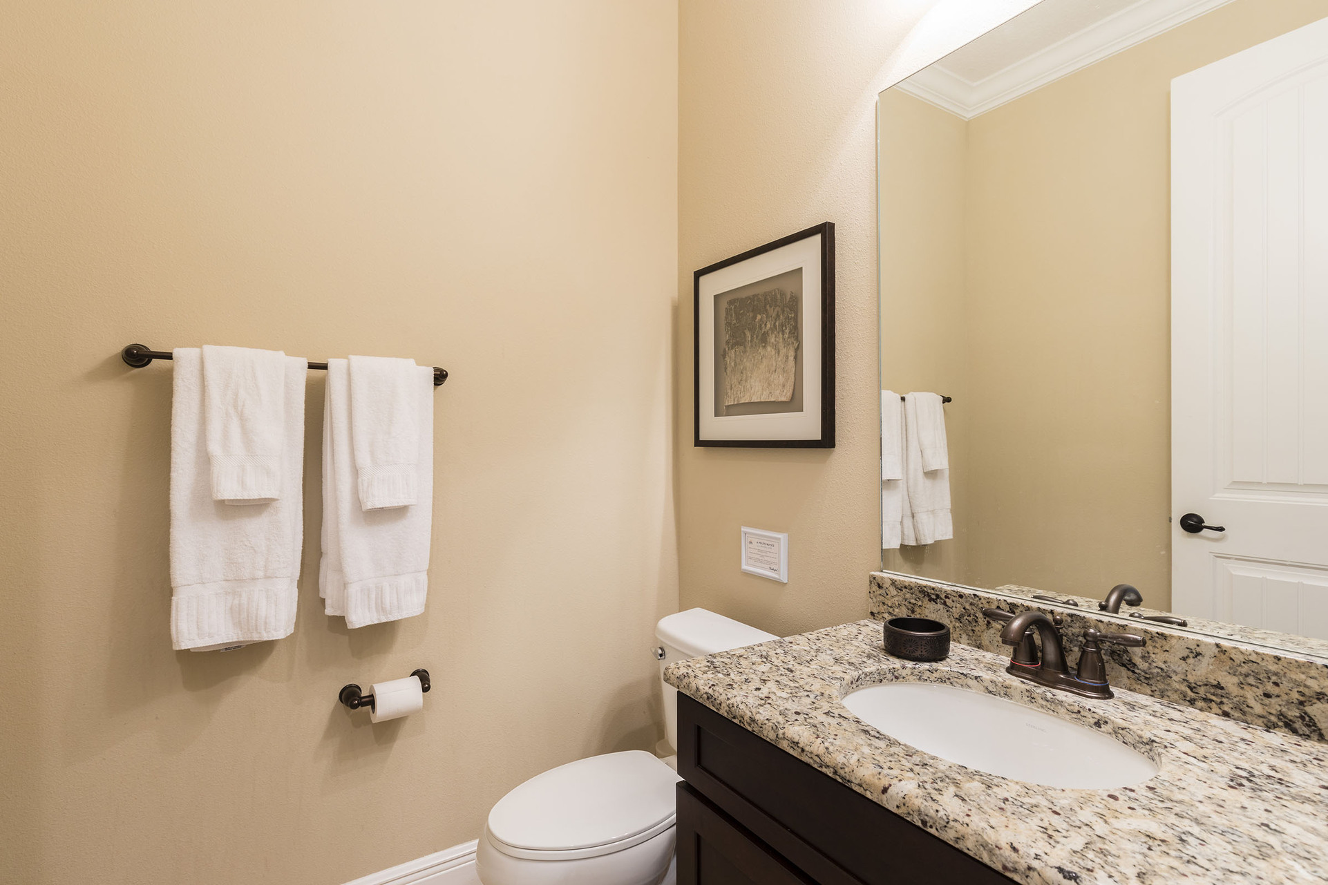The half bathroom is located on the ground floor
