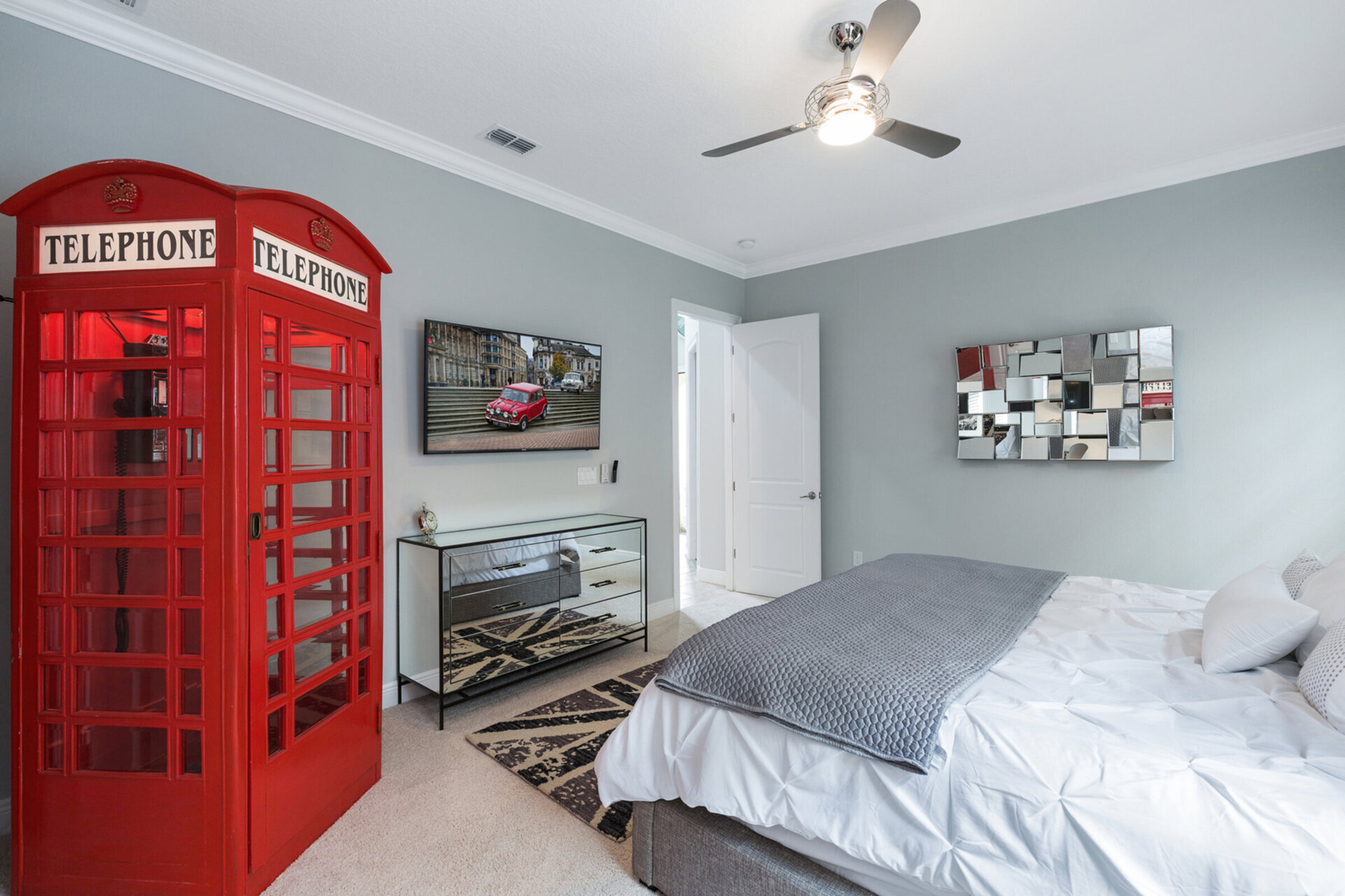 This bedroom even has a fully functional phone booth to complete the UK theme