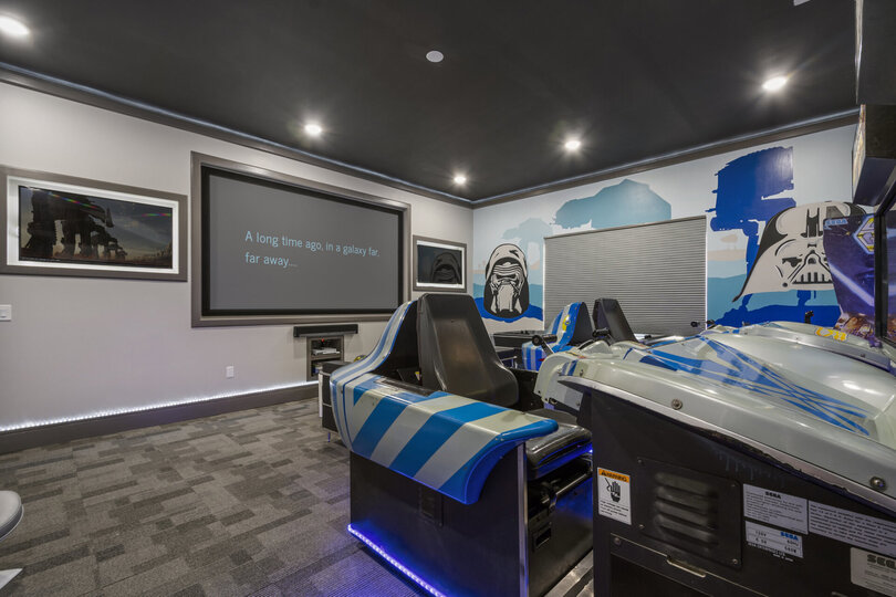The projection comes equipped with an Apple TV, Xbox, and Playstation game systems