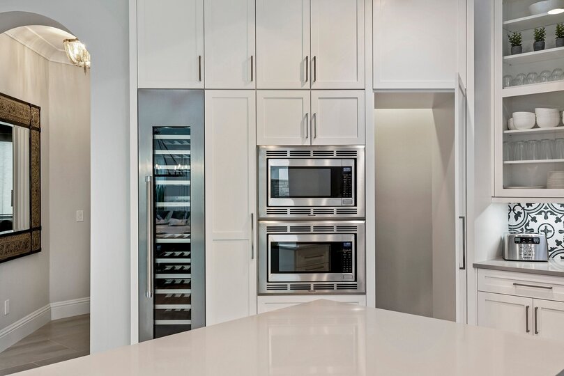 The kitchen features stainless steel appliances