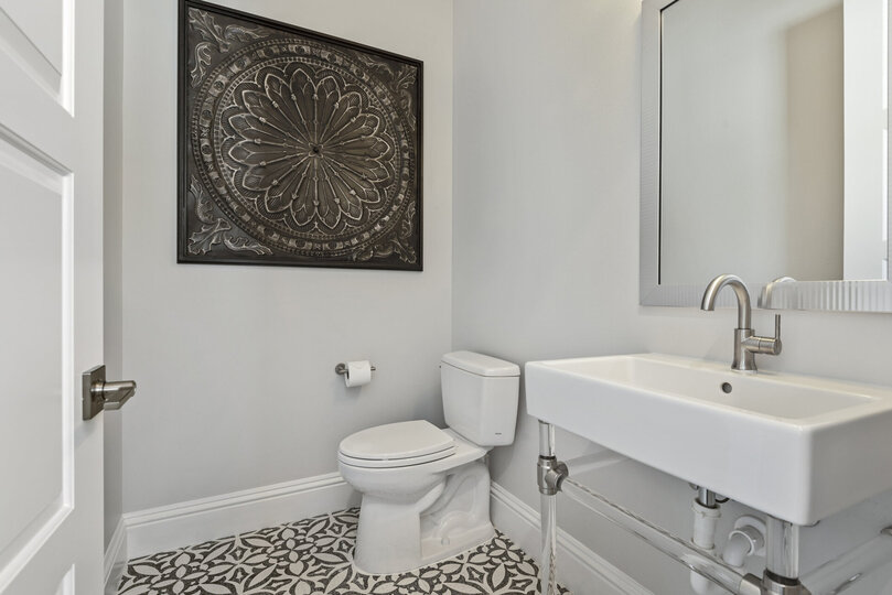 Second floor bathroom by the living room and movie theater