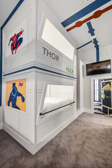 The Emperor Suite features two Full over Full Bunk Beds with a Twin trundle