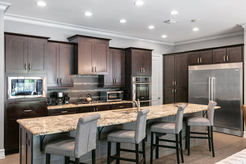 A fully equipped kitchen with stainless steel appliances