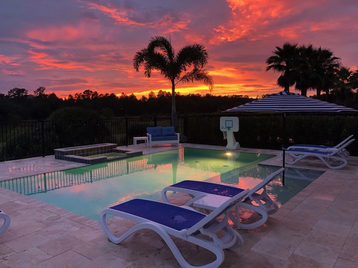 Relax in the spillover spa while you enjoy the sunset views