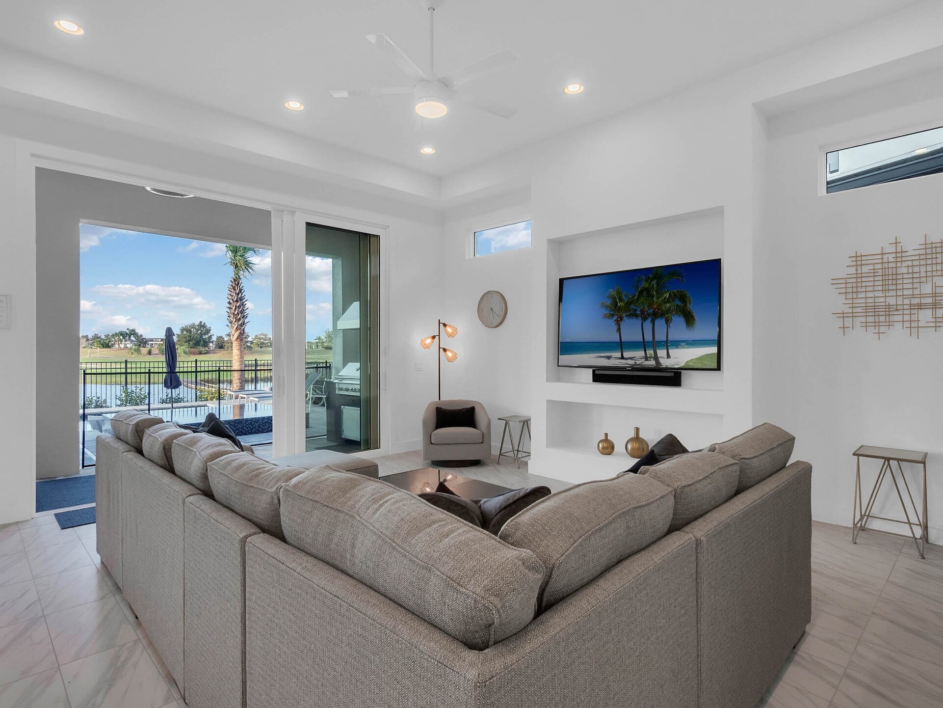 Watch TV on the 75-inch Smart TV
