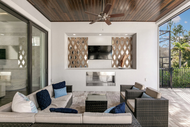 The pool patio has everything you could think of (Disclaimer: Fireplace(s) not allowed for guest use, homeowner use only.)