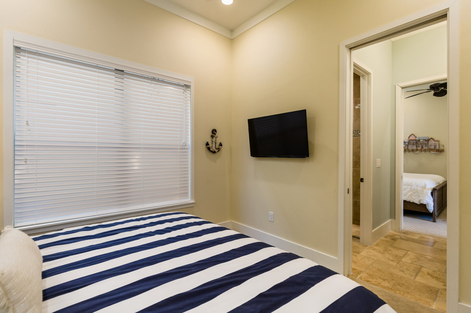 Featuring a TV and access to the Jack and Jill bathroom