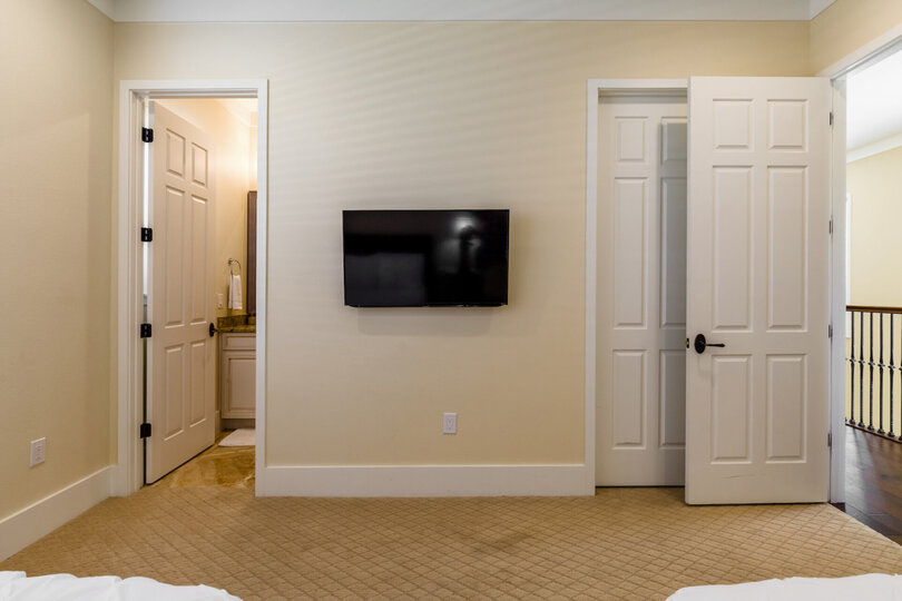 The room has a large closet and ensuite bathroom