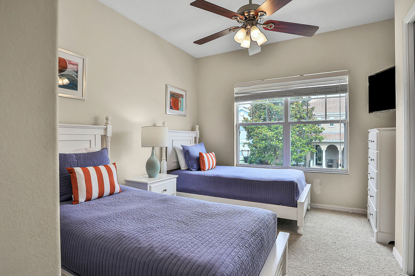 Get a good night's rest in this kids bedroom with 2 twin-size beds