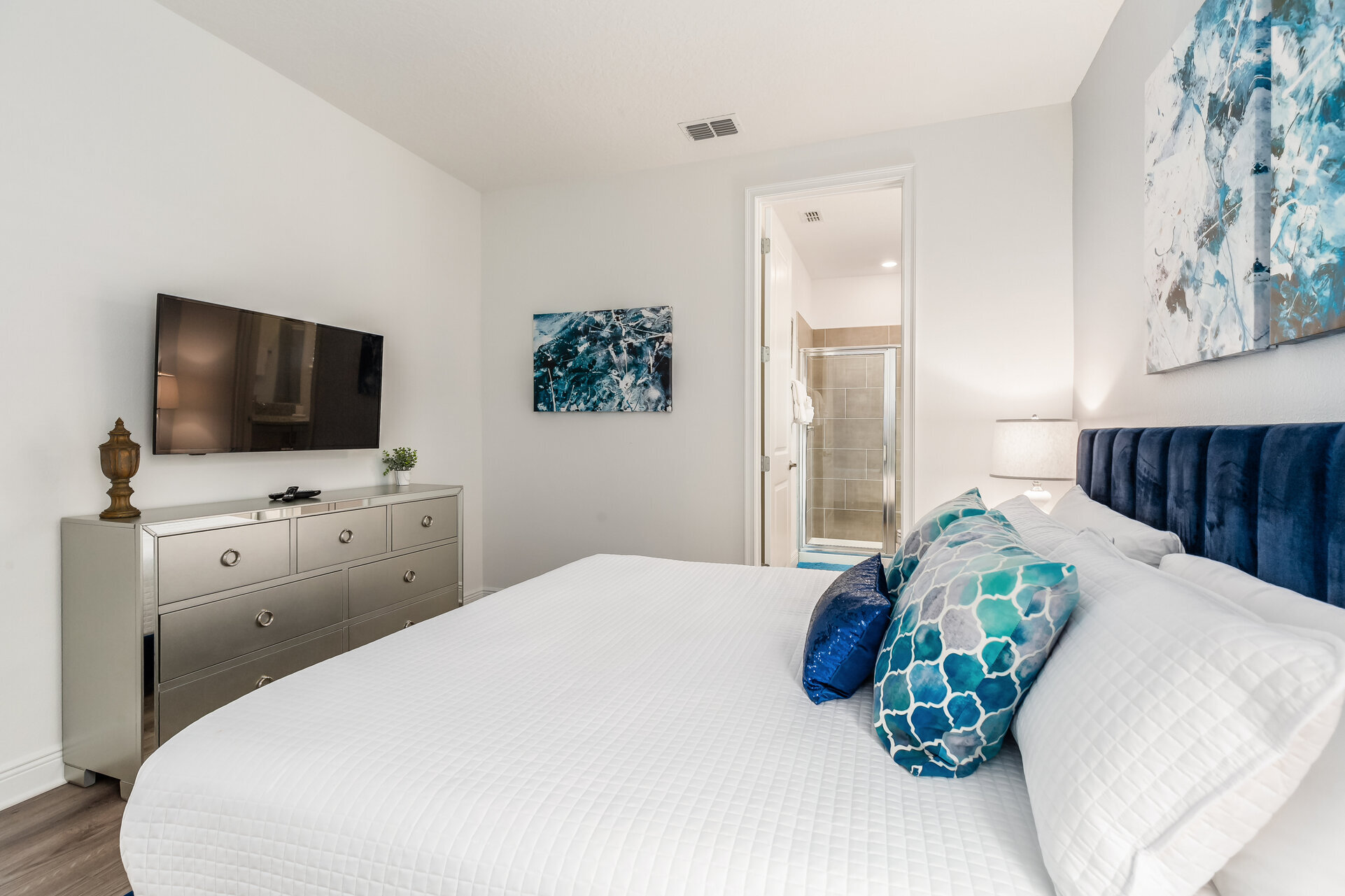 This bedroom features a king bed