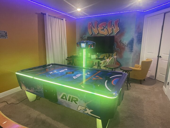 Air hockey table added March 2023.