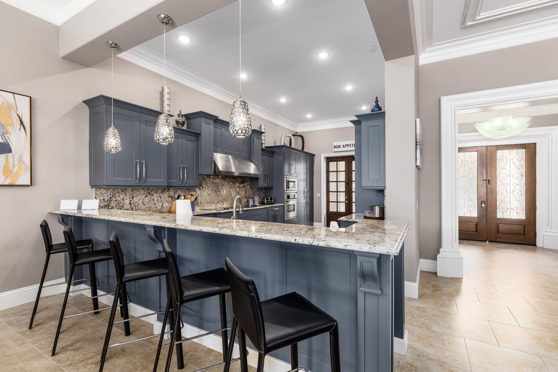 Plenty of comfortable seating and barstool seating for 5