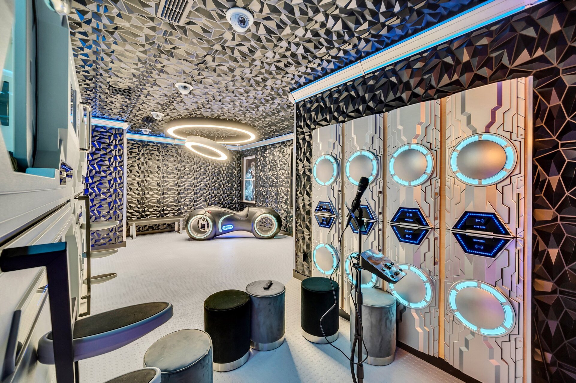 This karaoke stage is such a fun feature in this themed bedroom
