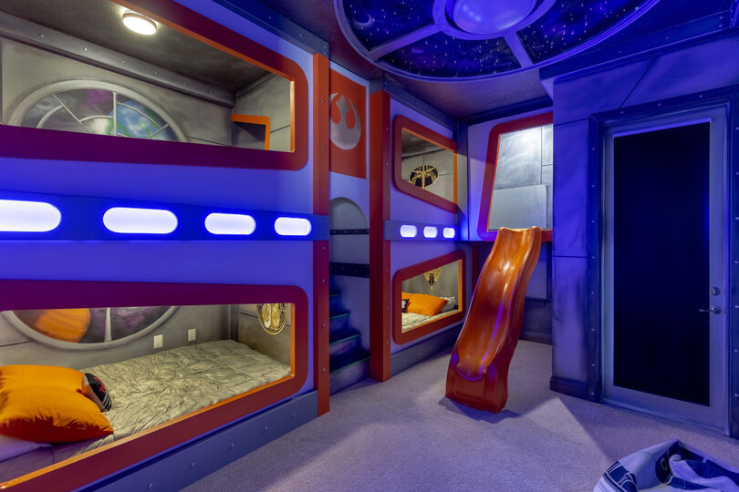 Venture upstairs to the custom built kids bedroom featuring some familiar friends