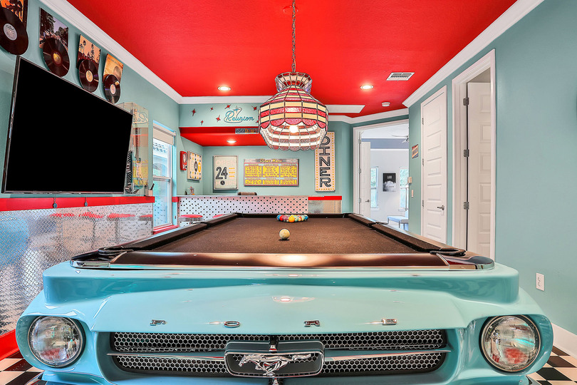 The pool table is an authentic Ford Mustang
