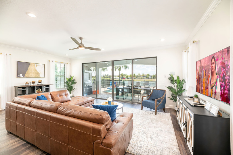 Gather together on the comfortable leather sectional sofa and watch your favorite TV show
