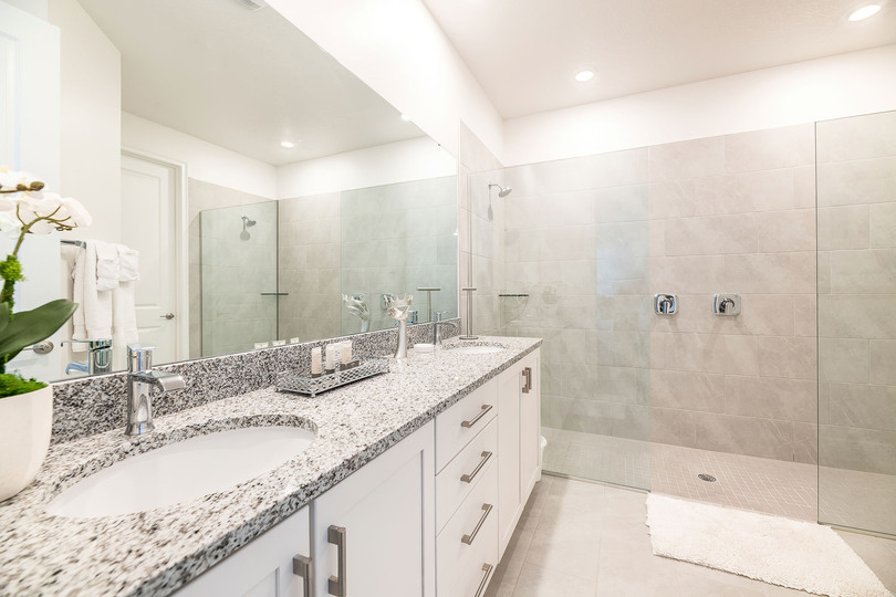 The master suite features an en suite bathroom with a double shower