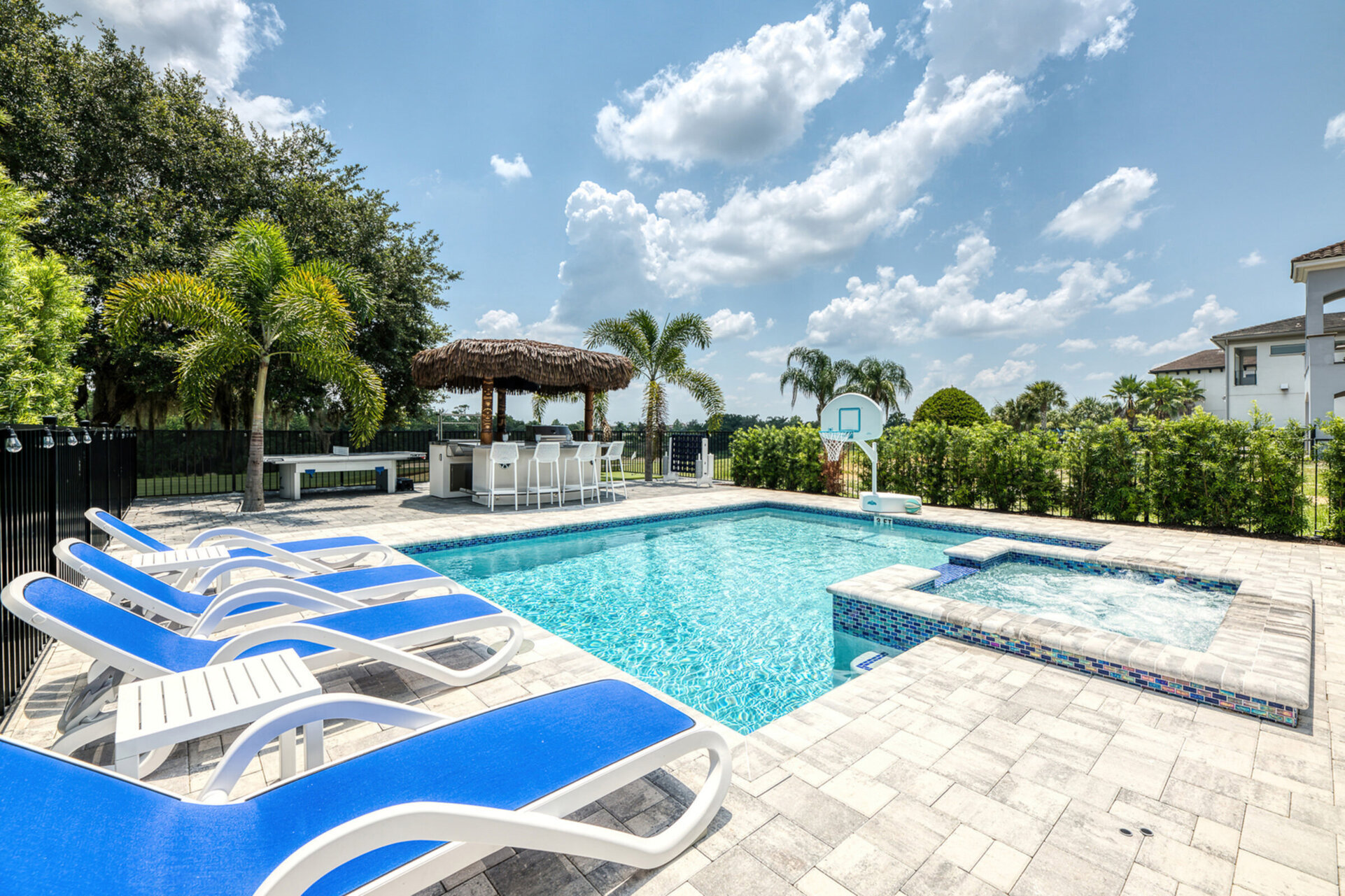 Soak up the sun in one of the poolside loungers
